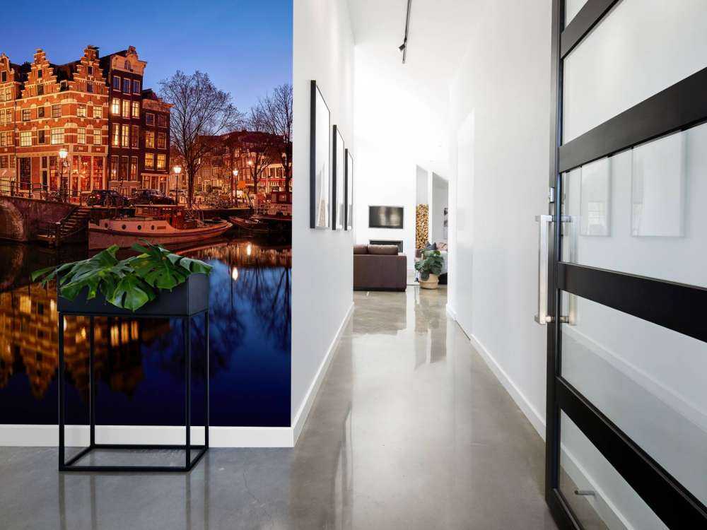 Illuminated houses along the canal