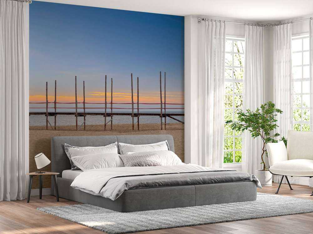 Long jetty with wooden posts