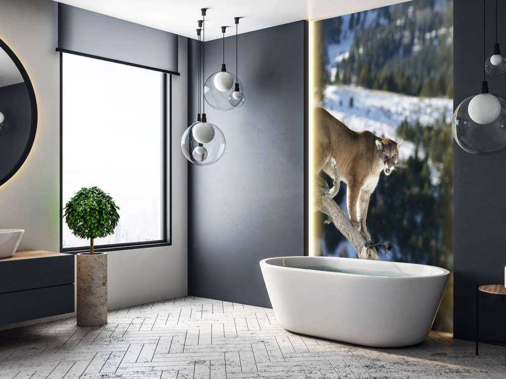 Mountain lion on a dead tree