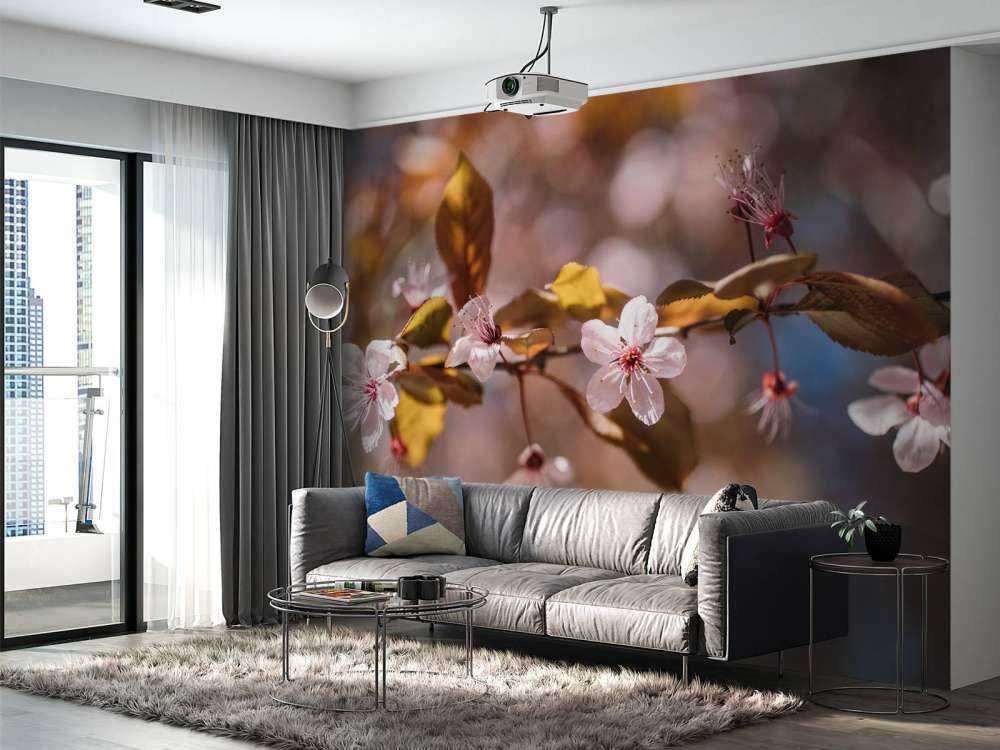 Pink blossoms and brown leaves