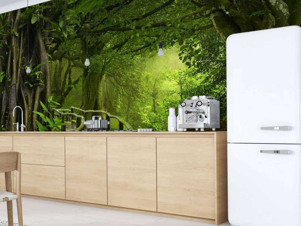 Wooden bridge through a green jungle