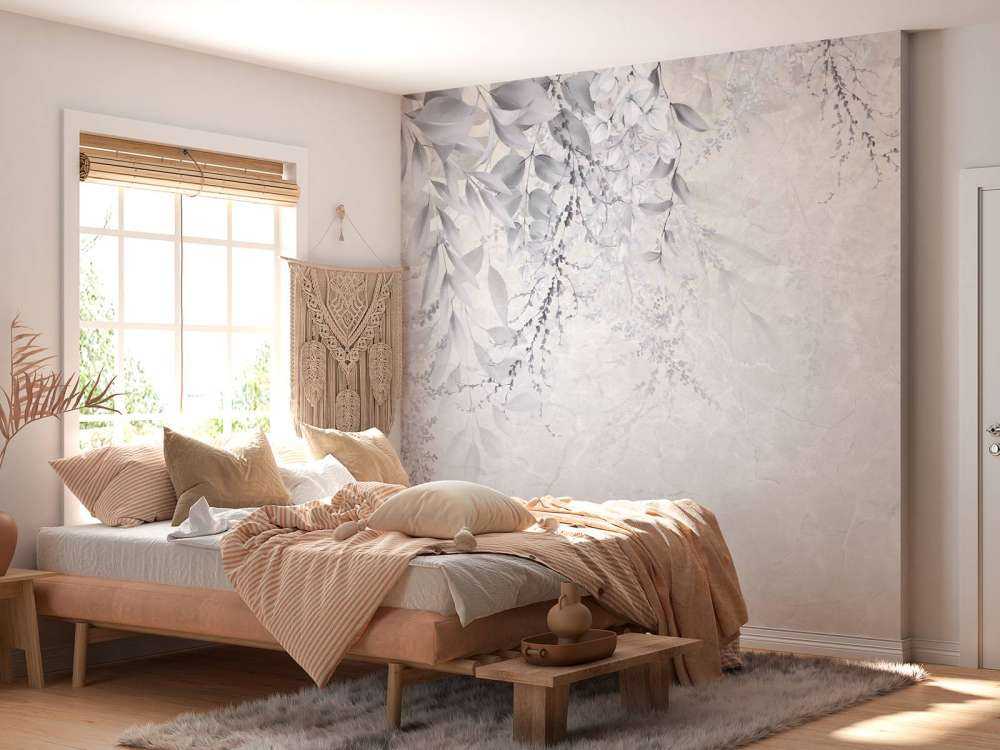 Leaves on marble wall