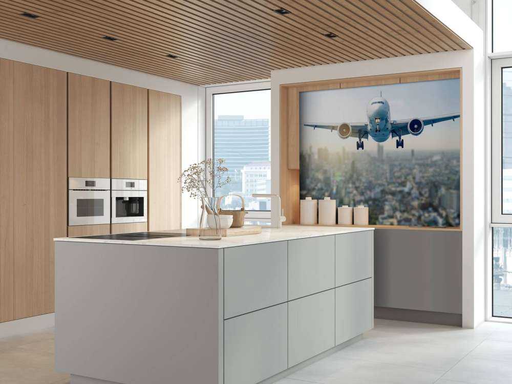 Descending airplane over a city