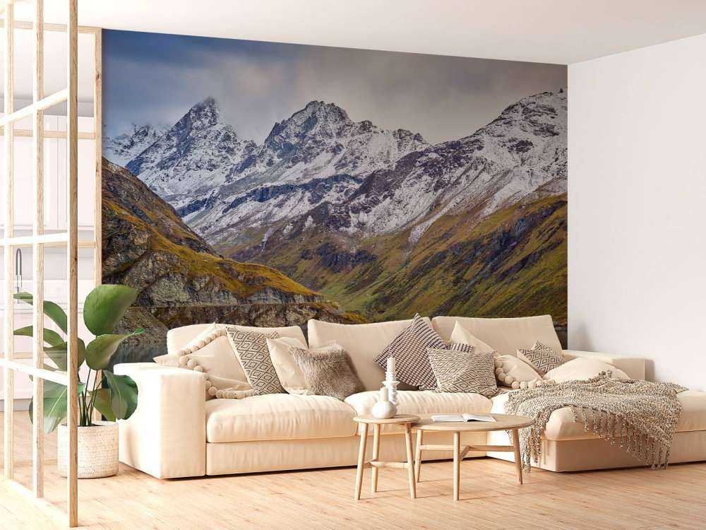 Mountain peaks with snow near mountain lake