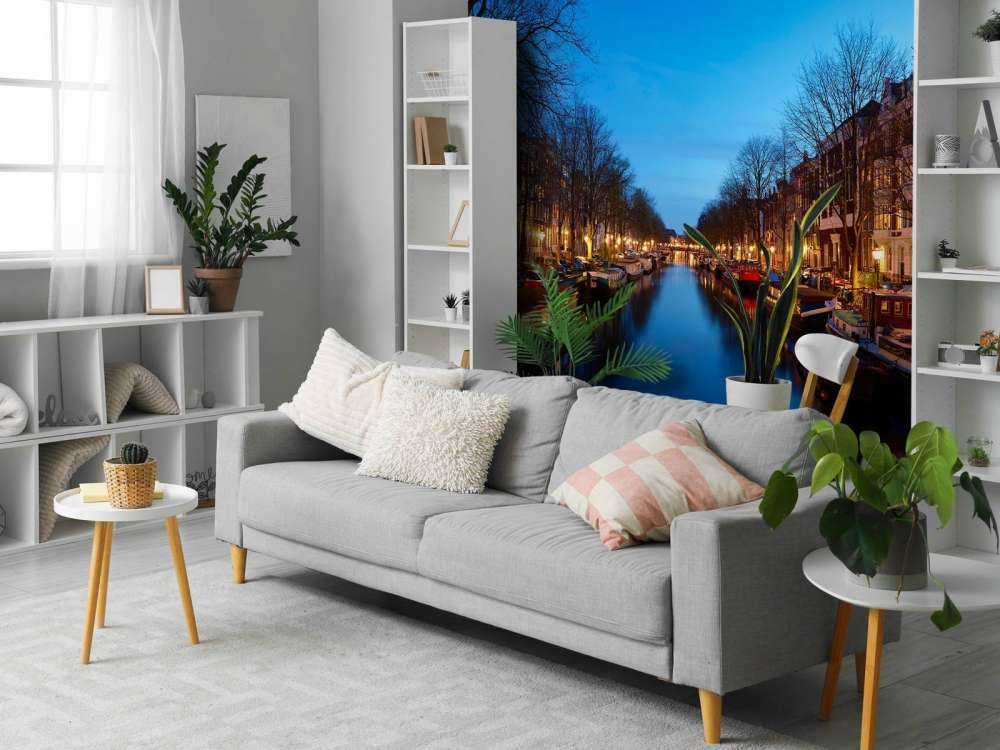 Houseboats along illuminated canal