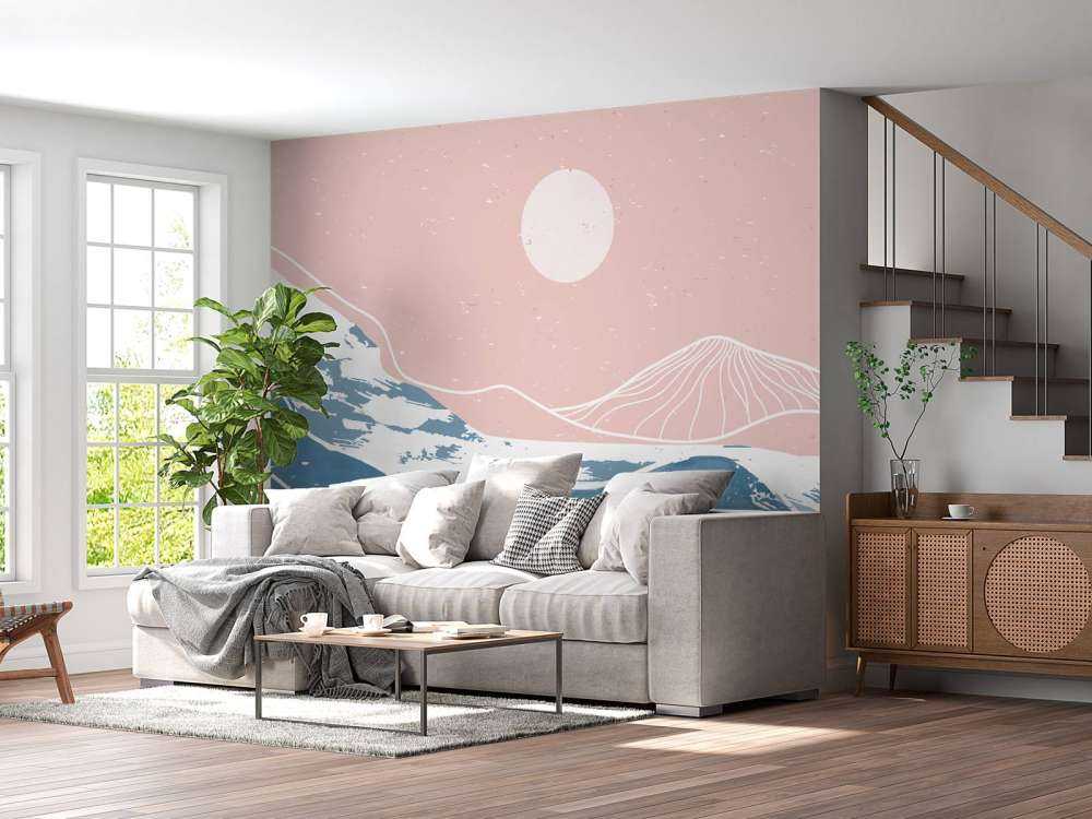 Winter mountains in front of the sun