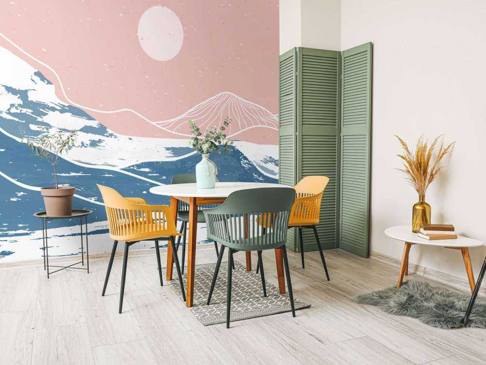 Winter mountains in front of the sun