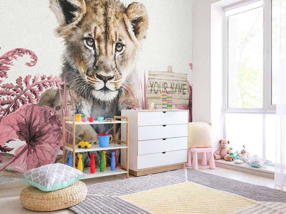 Young lion in the jungle pink