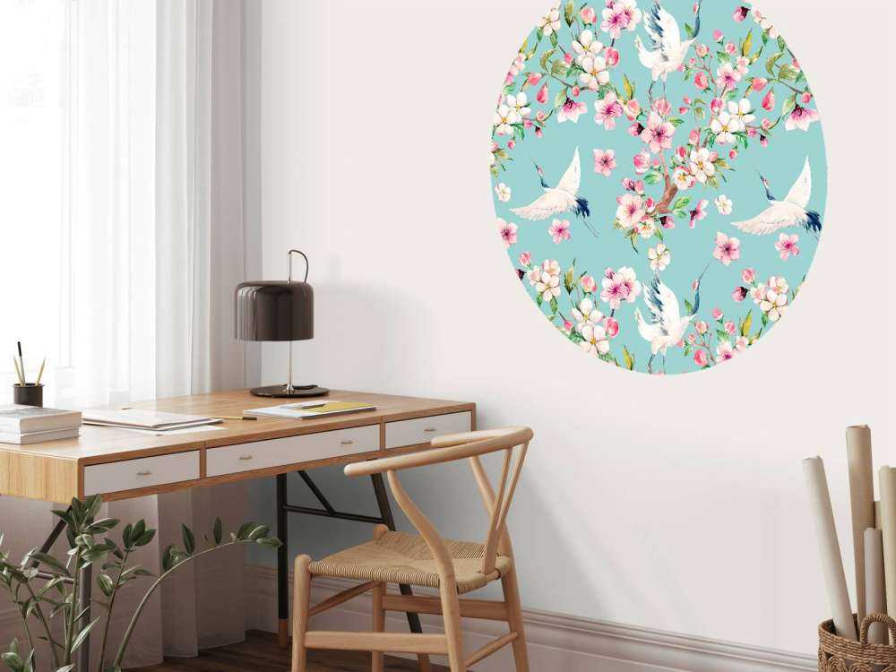 Cranes between pink flowers