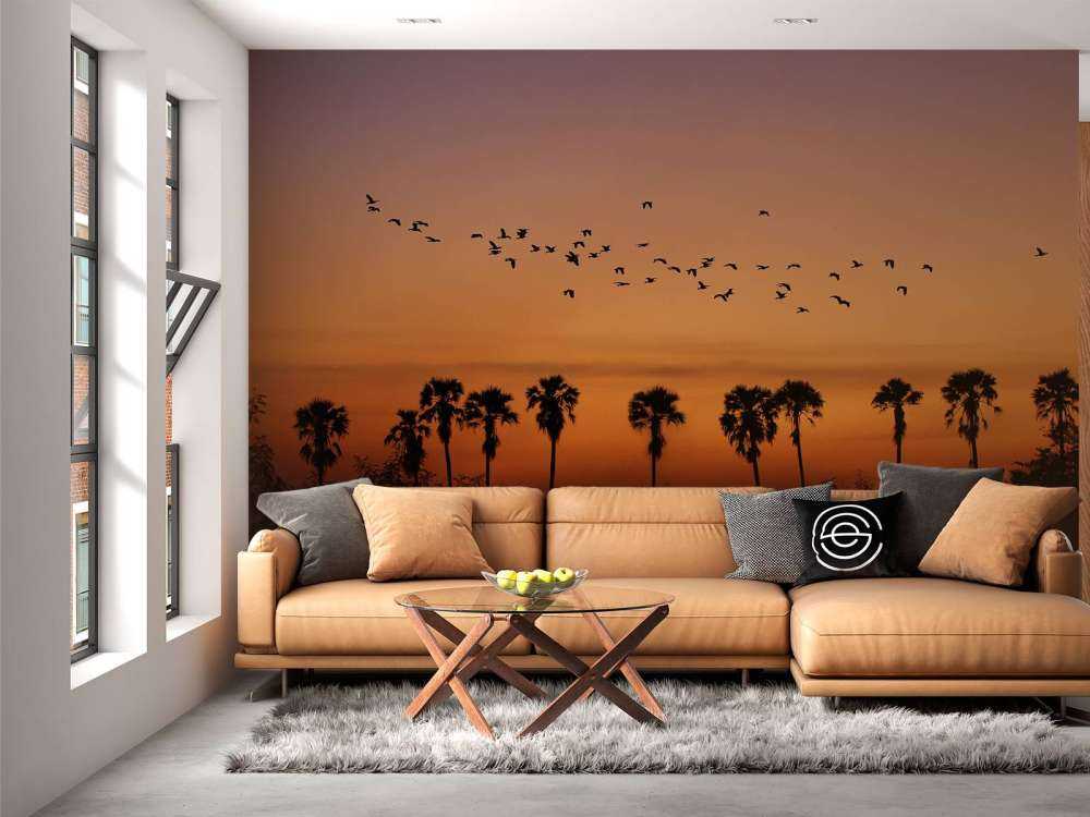 Palm trees with group of birds