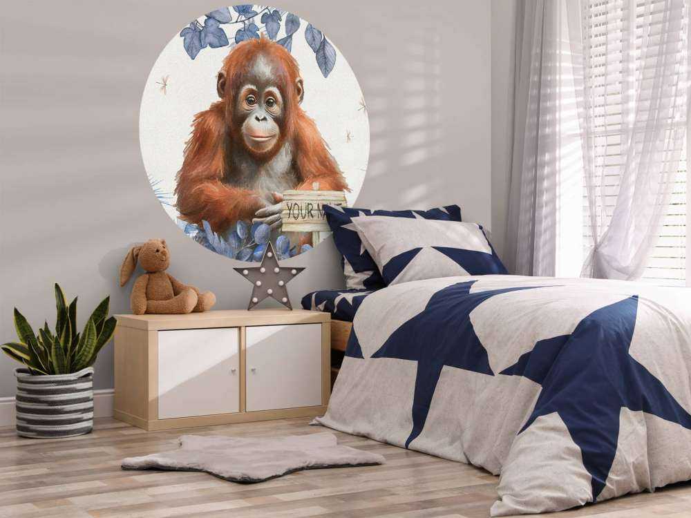 Young orangutan in the jungle blue