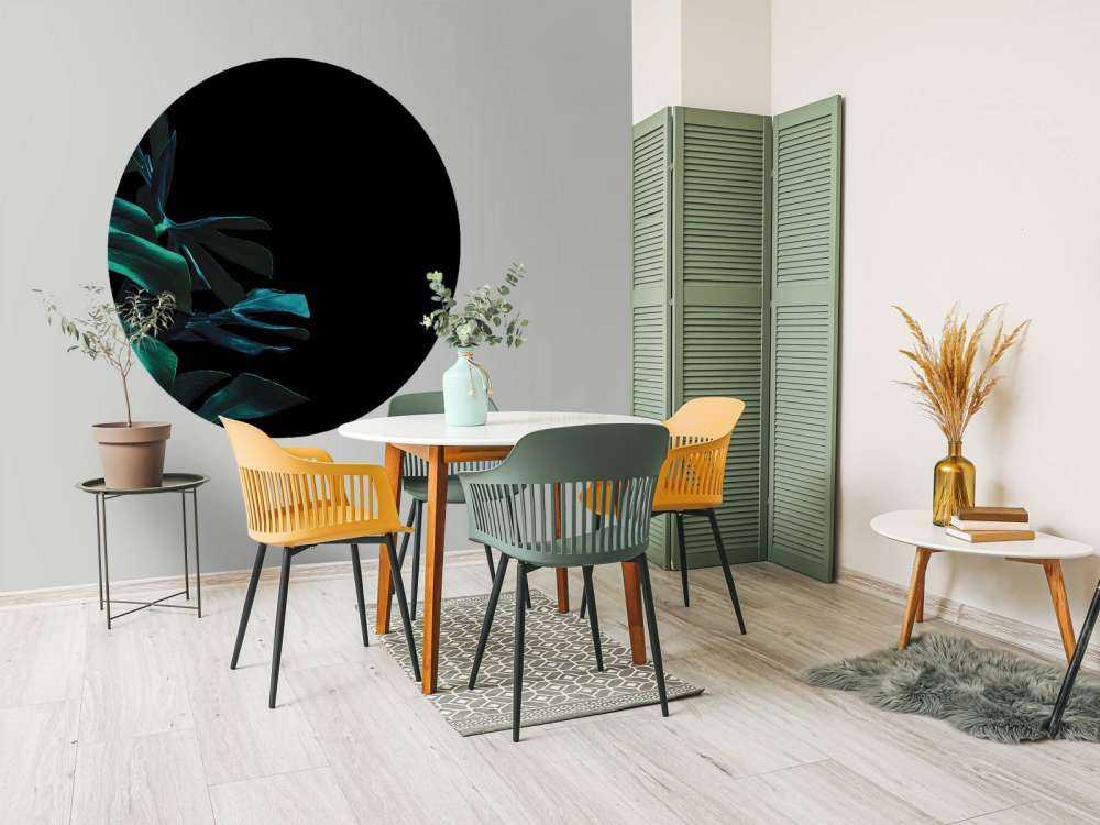 Tropical leaves on black background