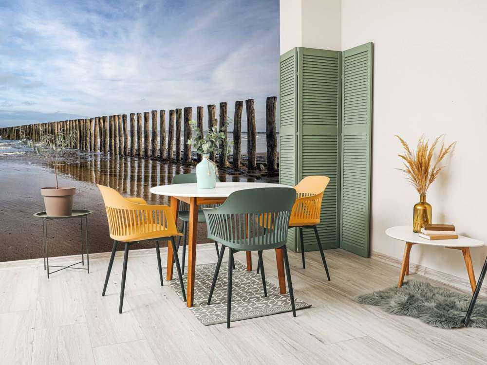 Wooden breakwater on the coast at Cadzand bath