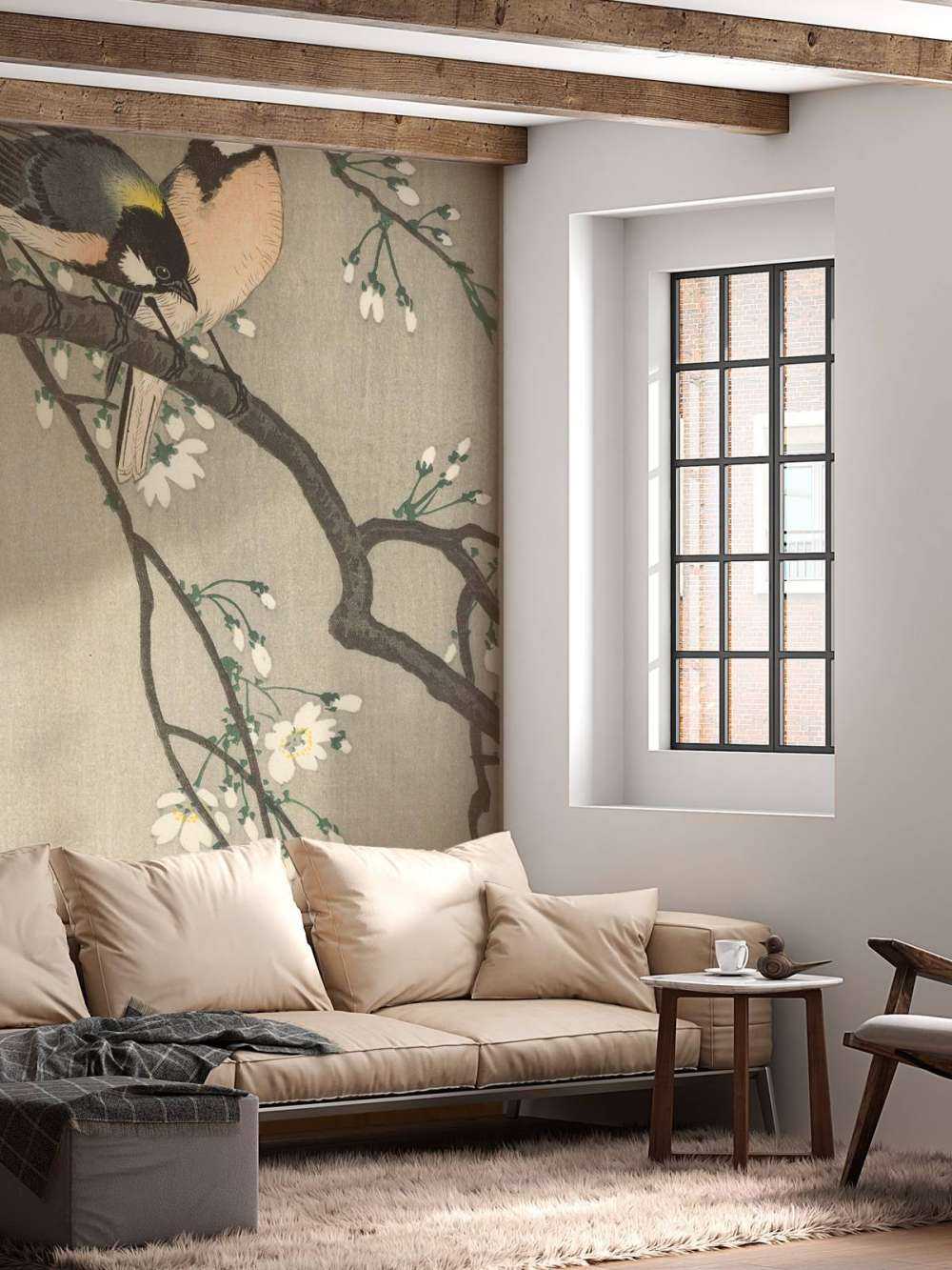 Great tits on blossom branch