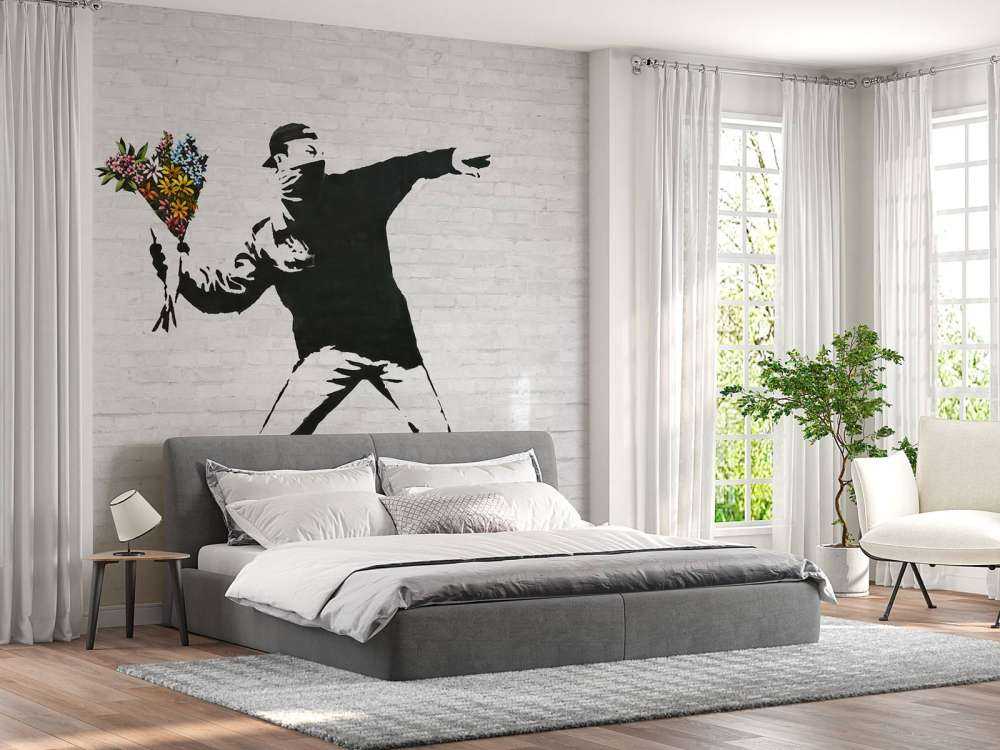 Banksy - Flower thrower, white bricks