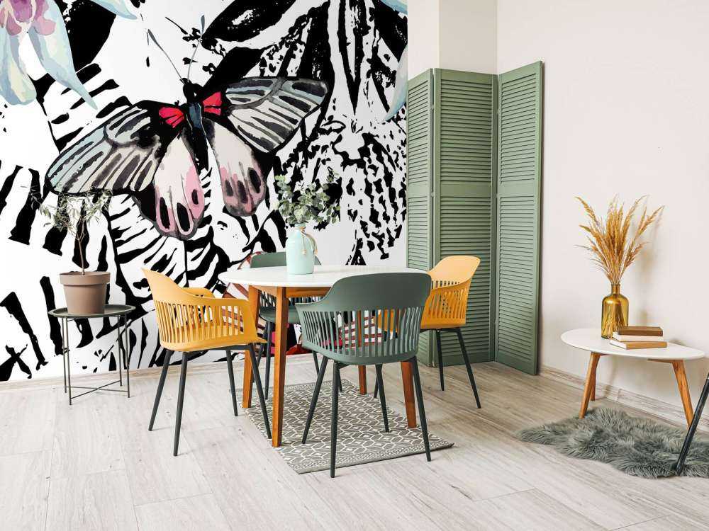 Aquarel van exotische vlinders en bloemen