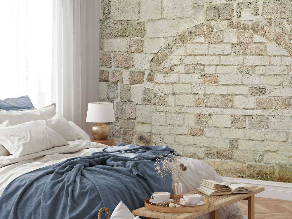 Old stone wall with arch