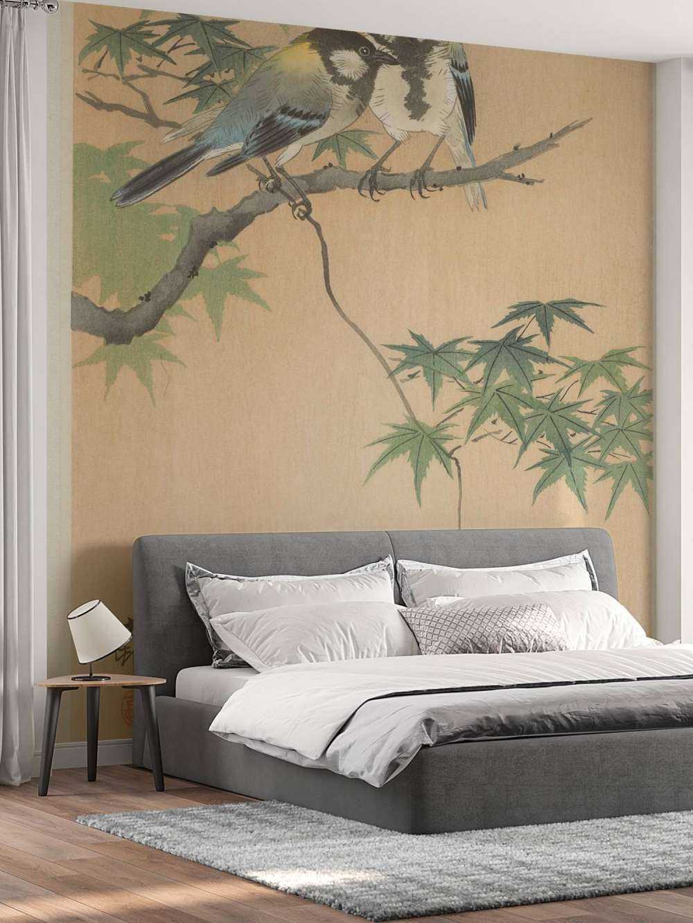 Great tits on maple branch