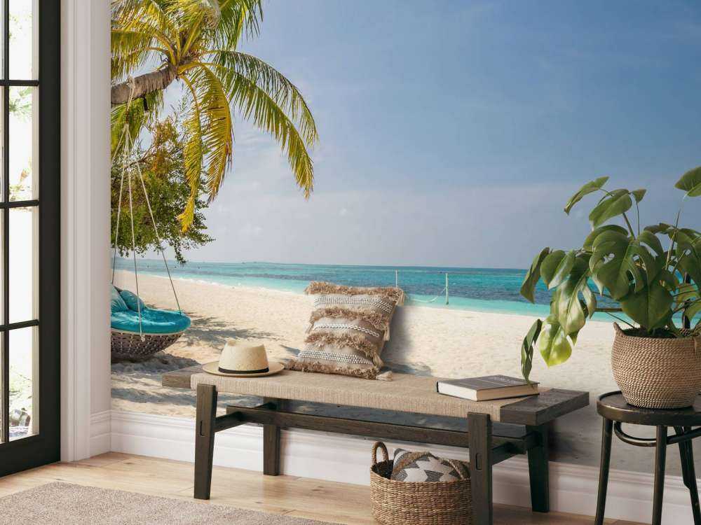 Tropical beach with swing