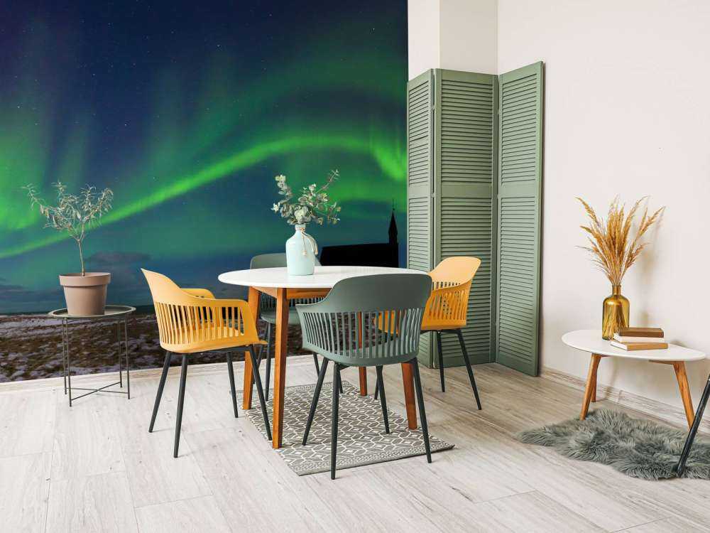 Northern lights above a church